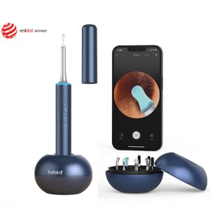 EAR/BeBird M9-S otoscope kit with the cover off and a smartphone showing video of the otoscope in the ear canal. Also pictured are alternate screw-on tips in a round container that also functions as a base for the scope.